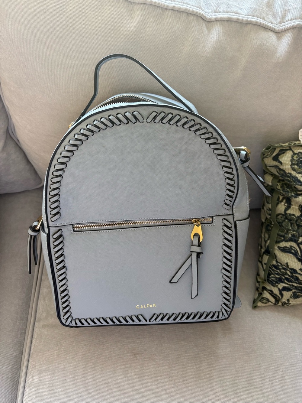 Calpak Kaya Baby Blue Whipstitch Backpack with Gold Accents